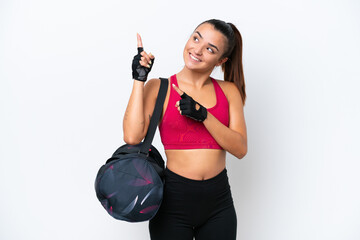 Wall Mural - Young sport woman with sport bag isolated on white background pointing with the index finger a great idea