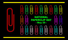 One Big Red Paper Clip And Several Colored Paper Clips Neatly Arranged With Bold Text In The Middle To Commemorate NATIONAL PAPERCLIP DAY On May 29