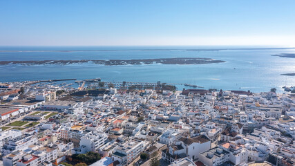 Canvas Print - Aerial view of Portuguese fishing tourist town of Olhao overlooking Ria Formosa Marine Park. church Matriz de Nossa Senhora do Rosario