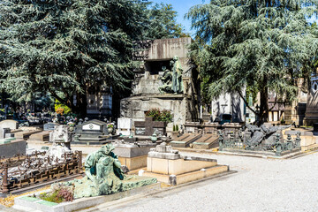 Wall Mural - Graves in the Monumental Cemetery of Milan, Lombardy region, Italy, where many notable people are buried.