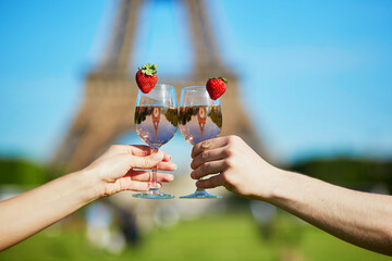 Wall Mural - Couple traveling in subway train with view to the Eiffel tower