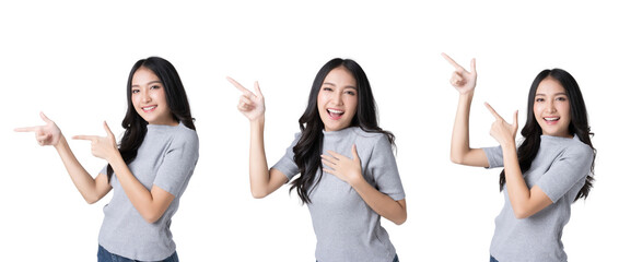 Wall Mural - Young Asian woman pointing fingers to empty space Isolate die cut on transparent background
