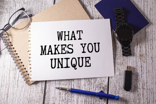 The question What Makes You Unique typed on a piece of lined paper