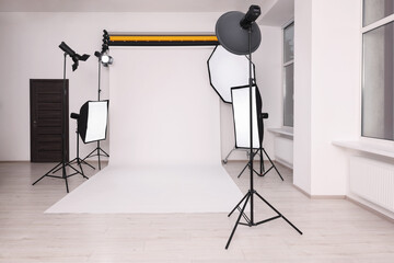 Wall Mural - Stylish photo studio with modern professional equipment