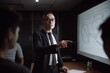 © Lee John - Businessman Presenting New Ideas on a Whiteboard With Generative AI Technology