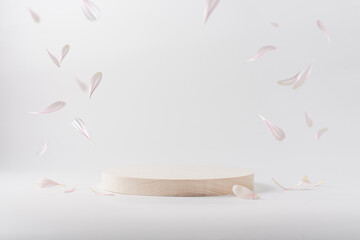 Wooden round podium pedestal cosmetic beauty product presentation empty mockup on  white background with gerbera flowers