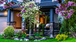 Luxury front yard house with colorful blooming flowers and shrubs. Beautiful house in residential neighborhood, Vancouver Canada. 
