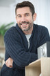 © auremar - home portrait of middle-aged bearded at home
