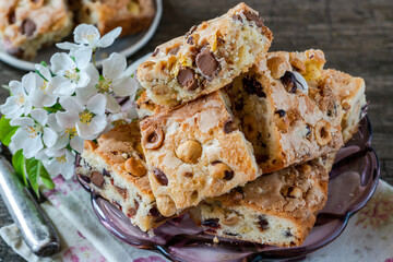 Canvas Print - Easter mini chocolate egg traybake with hazelnuts and cranberries cut into squares