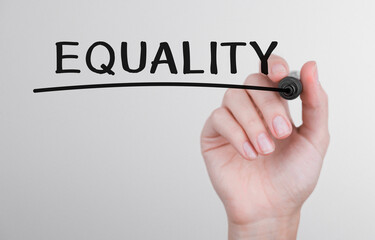 Poster - Womans hand writing word Equality with marker