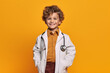 © ink drop - Studio portrait of a child wearing a doctor uniform with stethoscope. Generative ai