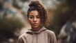 © bomoge.pl - Fit Woman in Neutral Athleisure Posing Against Natural Background. Generative AI.