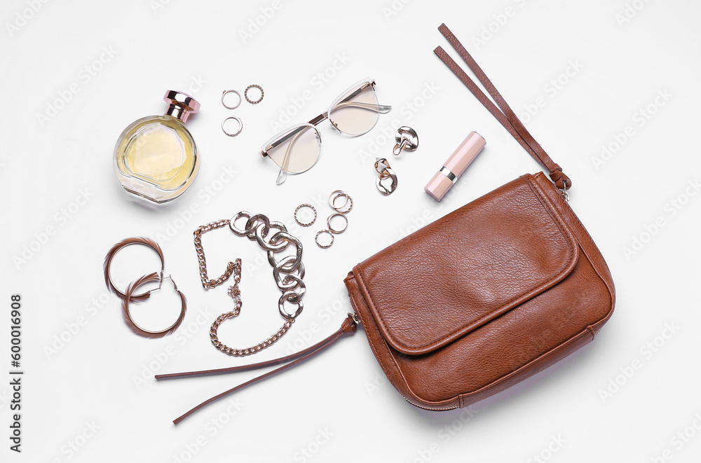 Composition with stylish female accessories isolated on white background