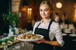 © wetzkaz - waitress carrying plates with meat dish on some festive event, party or wedding reception restaurant. Generative AI