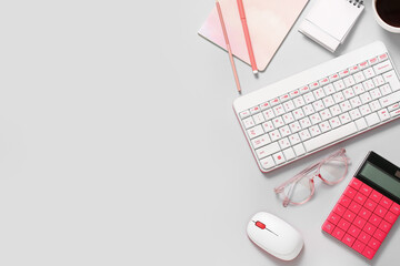 Composition with keyboard, glasses, calculator and notebook on white background