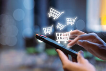 Woman Using Smartphone Shopping Online, Shopping Cart Icon On Screen Mobile Phone. Purchase Payment On Internet. Online Supermarket Gadget.