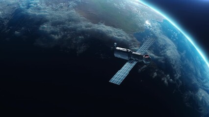 Wall Mural - sputnik or space module orbiting planet earth. the concept of technology and space