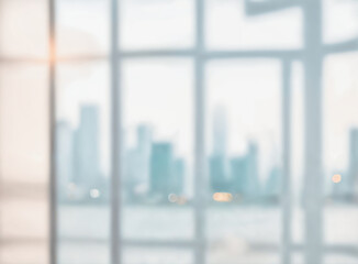 Poster - Blurred abstract glass wall from building in city town background.