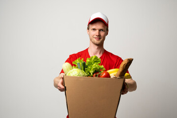 Sticker - Courier carrying package box of grocery food and drink from store. Delivery concept.