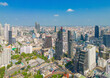 Aerial view of Bangkok Downtown Skyline, Thailand. Financial district and business centers in smart urban city in Asia. Skyscraper and high-rise buildings at sunset.