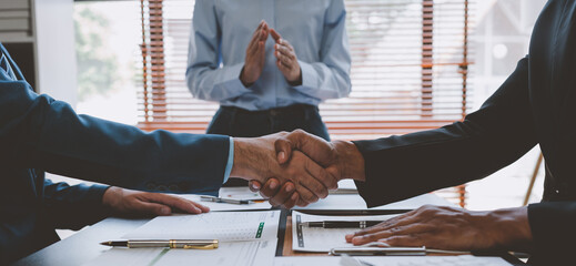 business partners successful handshake congratulations business teamwork winning success deal in mod