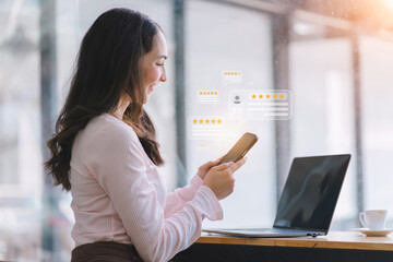 A customer hands pressing on a smartphone screen with a gold five-star rating feedback icon.User give rating to service experience on online application. Client review and customer rating concept