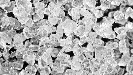 Poster - Freeze motion of flying crushed ice isolated on black background.