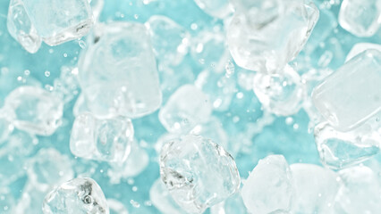 Aufkleber - Freeze motion of flying ice cubes isolated on blue background.