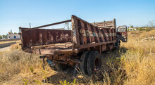 Old Rusty Truck Abandoned On The Grass