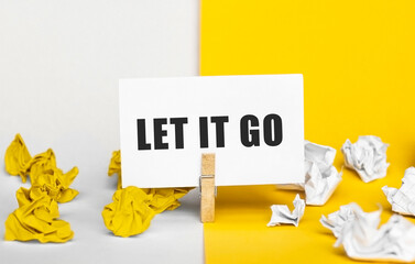 Fototapete - Card with text LET IT GO on yellow and white backgrounds