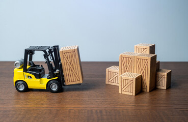 Wall Mural - Forklift and wooden crates. Logistic infrastructure and warehousing services. Transportation industry. Trade Shipping logistics. Supply by products and goods. Hub for the storage and movement of goods