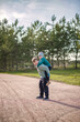 © Alina Lebed - Two funny boys-brother and friend, walking together in the spring park, running, jumping and enjoying.