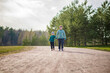 © Alina Lebed - Two funny boys-brother and friend, walking together in the spring park, running, jumping and enjoying.