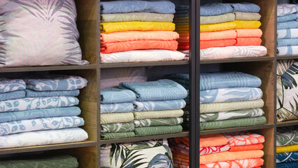 Poster - Colorful folded towels stack closeup picture, hotel service concept background