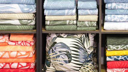 Leinwandbilder - Colorful folded towels stack closeup picture, hotel service concept background