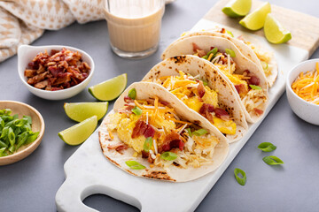 Wall Mural - Breakfast tacos with hash browns, eggs and bacon