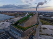Aerial view of Amager Bakke, also known as Amager Slope or Copenhill, a combined heat and power waste-to-energy plant and recreational facility in Amager, Copenhagen Denmark