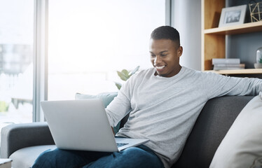 Sticker - Black man with laptop, streaming online and relax in living room, subscription service with internet and happiness. Technology, connectivity and male person chill at home watching movie on sofa