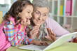 © aletia2011 - grandmother and daughter using laptop