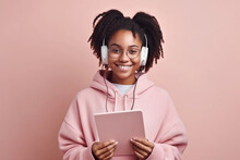 A Young Black Woman Wearing A Pink Hoodie Holds A Tablet In Her Hands. AI Generation