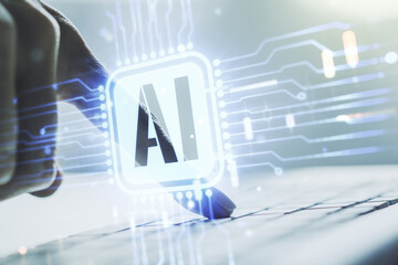Poster - Double exposure of creative artificial Intelligence icon with hands typing on laptop on background. Neural networks and machine learning concept