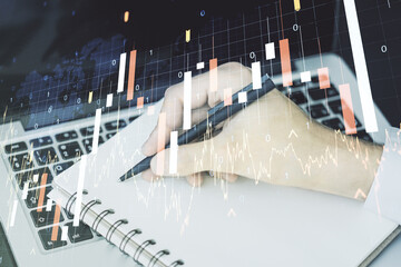 Poster - Multi exposure of abstract financial graph with world map and with hand writing in diary on background with laptop, financial and trading concept