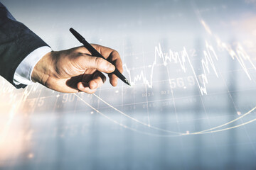 Poster - Multi exposure of trader hand with pen working with virtual abstract financial graph interface on blurred office background, financial and trading concept