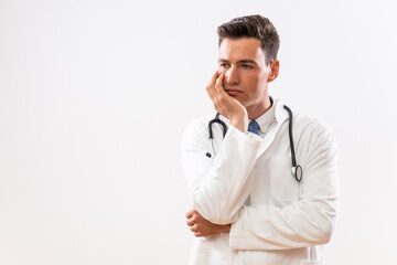 Wall Mural - Image of worried doctor thinking.