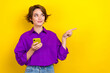 canvas print picture - Photo of charming person hold smart phone look direct finger empty space wear violet isolated on yellow color background