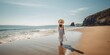 A tourist woman in white dress and hat enjoys the beautiful beach, created with Generative AI technology