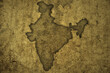 map of india on a old vintage crack paper background .