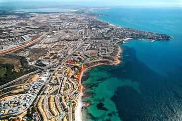 Wall Mural - Dehesa de Campoamor seaside and townscape view from above. Spain