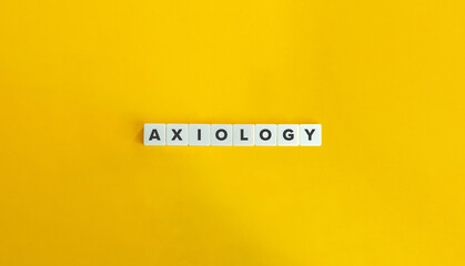 Wall Mural - axiology - philosophical study of value. word on letter tiles on yellow background. minimal aestheti