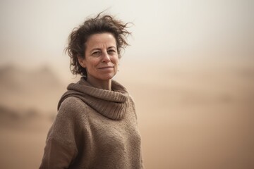 Poster - Environmental portrait photography of a satisfied woman in her 40s wearing a cozy sweater against a sandstorm or dust storm background. Generative AI